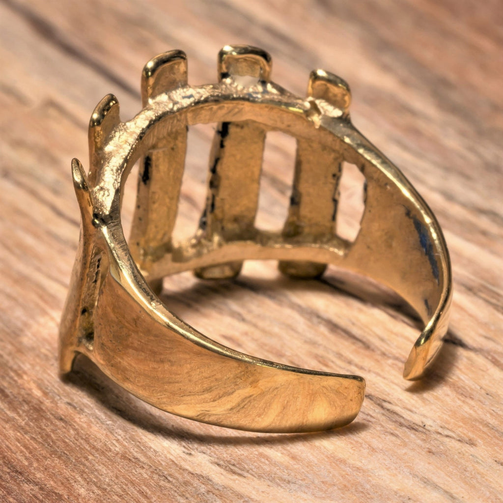 An adjustable, handmade pure brass, open line striped ring designed by OMishka.