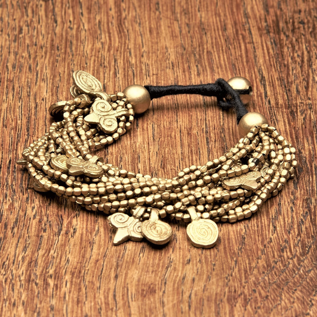 Artisan handmade pure brass, chunky multi strand beaded, spiral charm bracelet designed by OMishka.