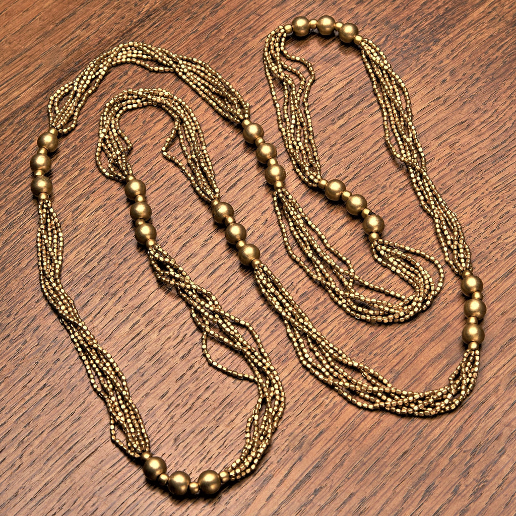 Artisan handmade, chunky, pure brass, long beaded multi strand necklace designed by OMishka.