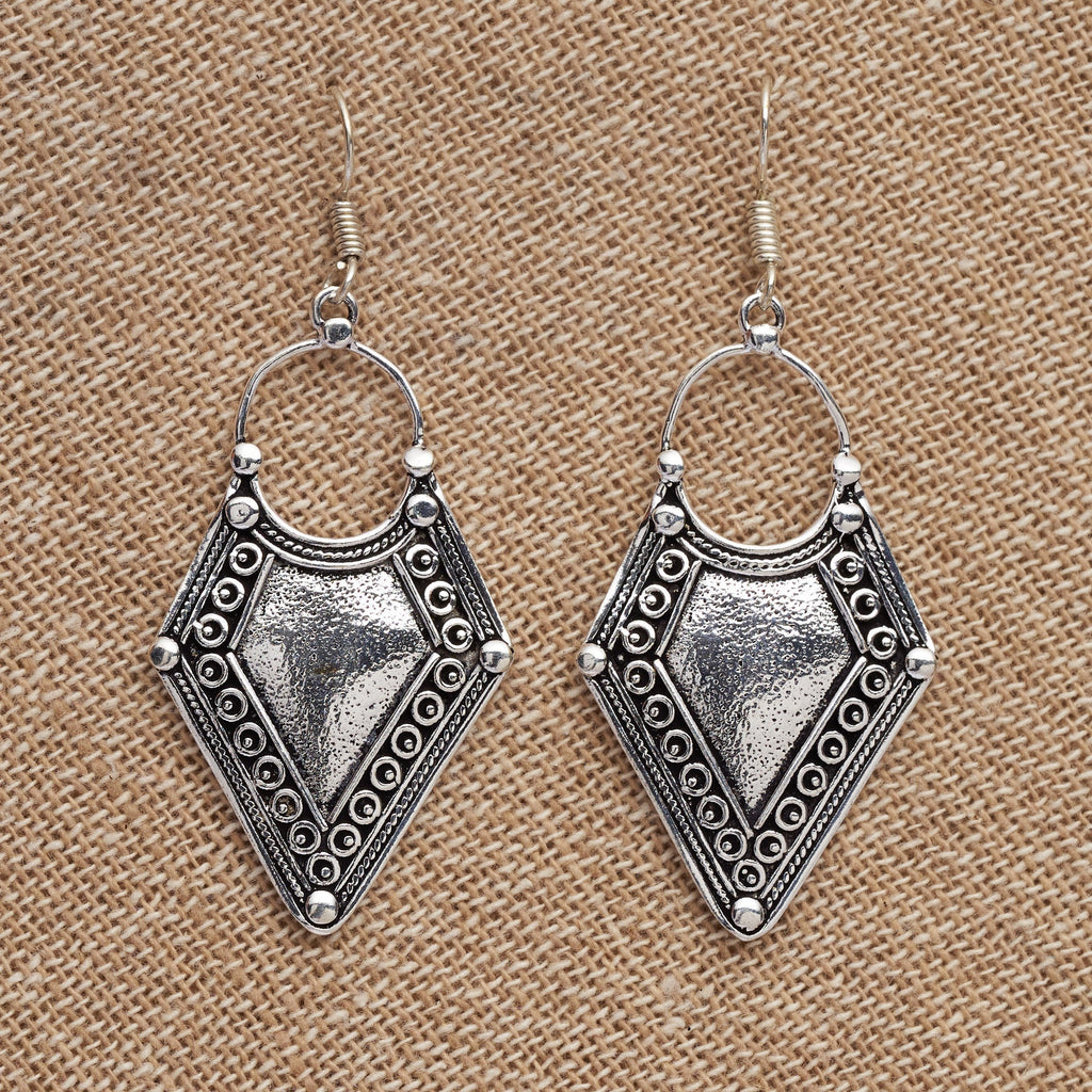 Artisan handmade solid silver, long, hollow tribal shield, dangle hook earrings designed by OMishka.