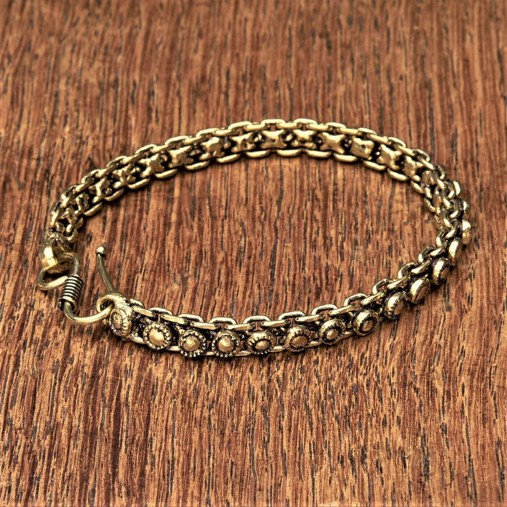 Handmade golden toned brass, skinny banjara disc chain bracelet designed by OMishka.