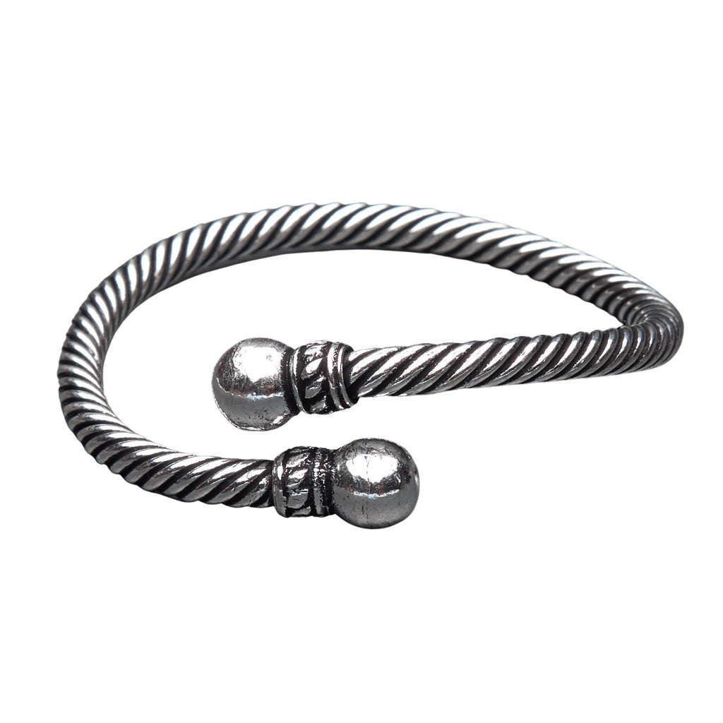 A handmade twisted silver rope torque bracelet designed by OMishka.