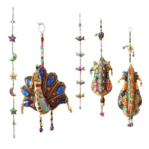 OMishka collection of beautifully and ethically handmade hanging tota decorations.