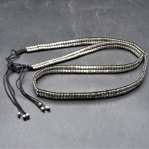 A Banjari tribeswomen influenced, handwoven silver beaded and black waxed cord, adjustable skinny belt designed by OMishka.