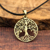 Brass round tree of life pendant.