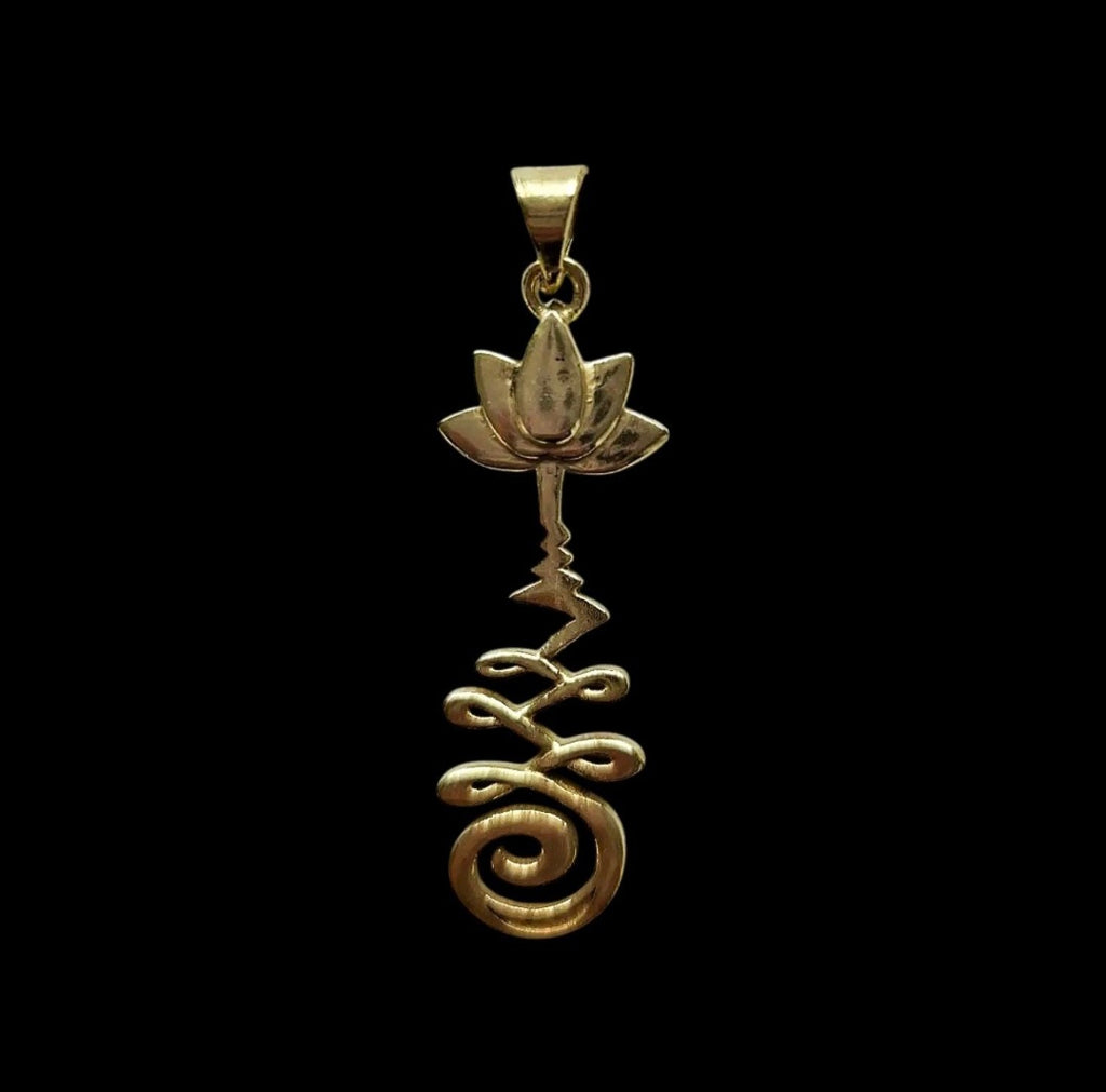 Brass pendant with a lotus flower and Unalome design.