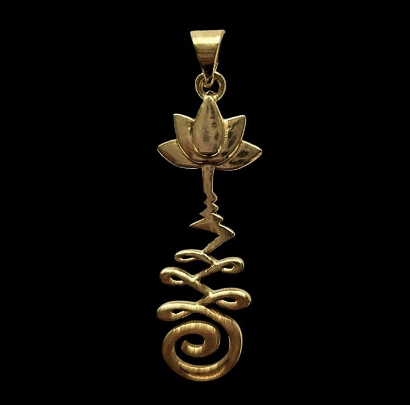 Brass pendant with a lotus flower and Unalome design.