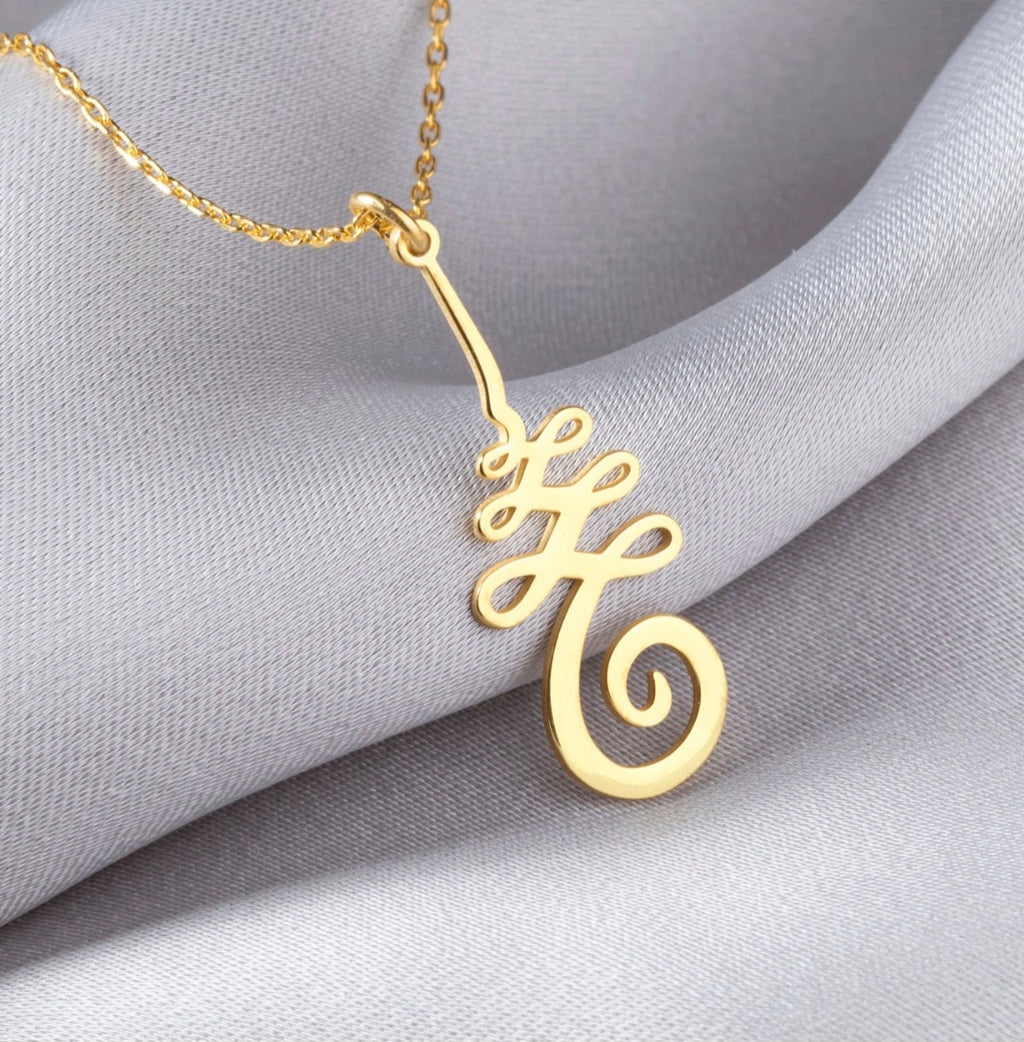 Pure brass necklace with a decorative Unalome pendant.