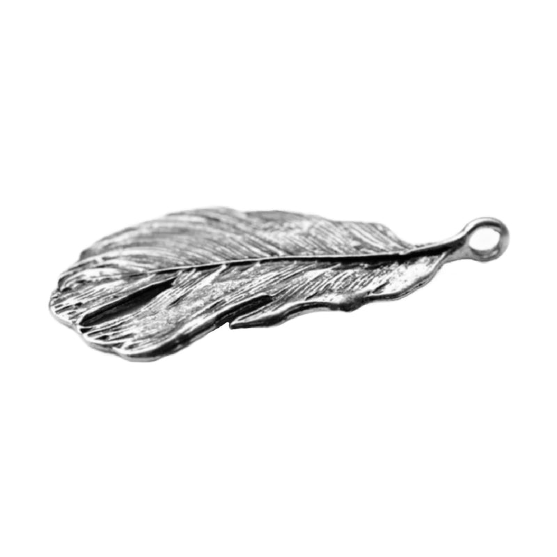 Feather pendant designed by OMishka.
