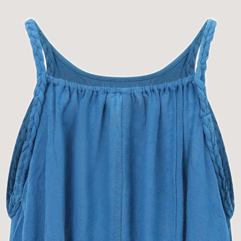 Blue linen handkerchief hem midi dress with a plait strap detail designed by OMishka