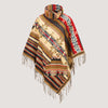 Brown mix coloured roll neck, Aztec patterned, fringed poncho designed by OMishka