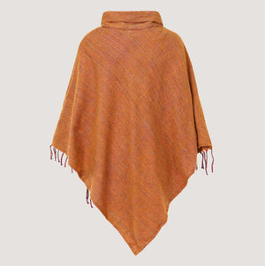 Burnt orange cowl neck poncho featuring kantha embroidery and a fringed hemline designed by OMishka