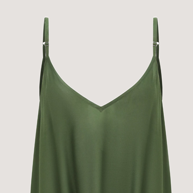 Green sleeveless harem jumpsuit with tapered legs and seam pockets designed by OMishka