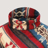 Red mix coloured, super soft bamboo poncho, Aztec patterned with a fringed hem designed by OMishka