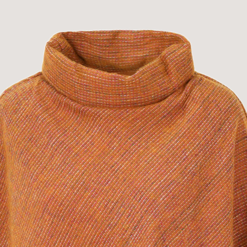 Spiced orange, super soft bamboo poncho, kantha embroidered with a fringed hem designed by OMishka