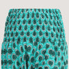 Teal peacock print 2-in-1 harem pants jumpsuit designed by OMishka