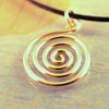 Open spiral pure brass pendant.