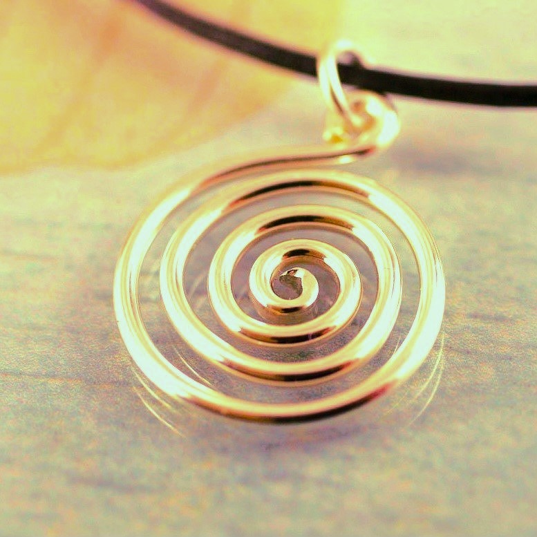 Open spiral pure brass pendant.