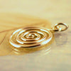 Pure brass open spiral pendant necklace.