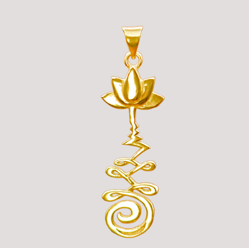 Gold coloured brass pendant with unalome and lotus flower design.