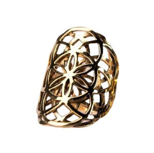 An adjustable, chunky, artisan handmade pure brass, double layered seed of life ring designed by OMishka.