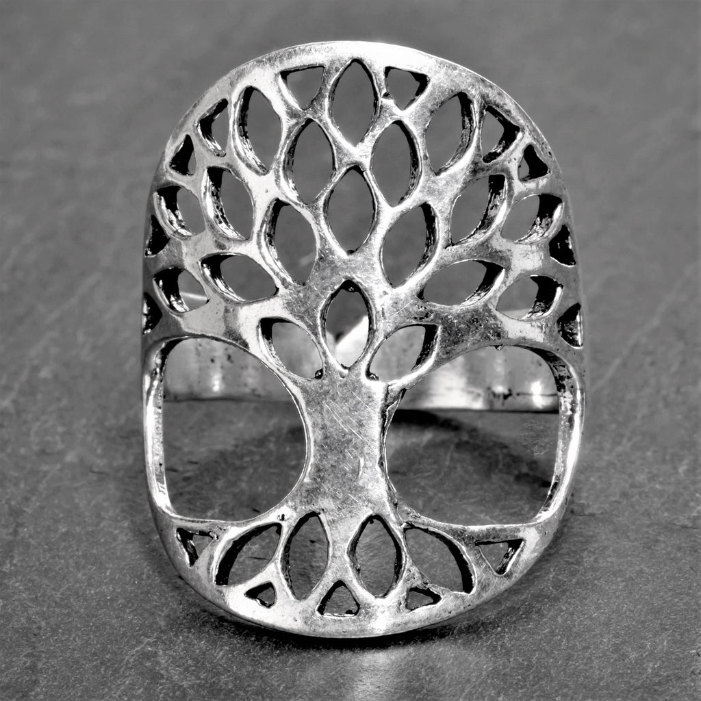 An adjustable, chunky, artisan handmade solid silver, tree of life ring designed by OMishka.