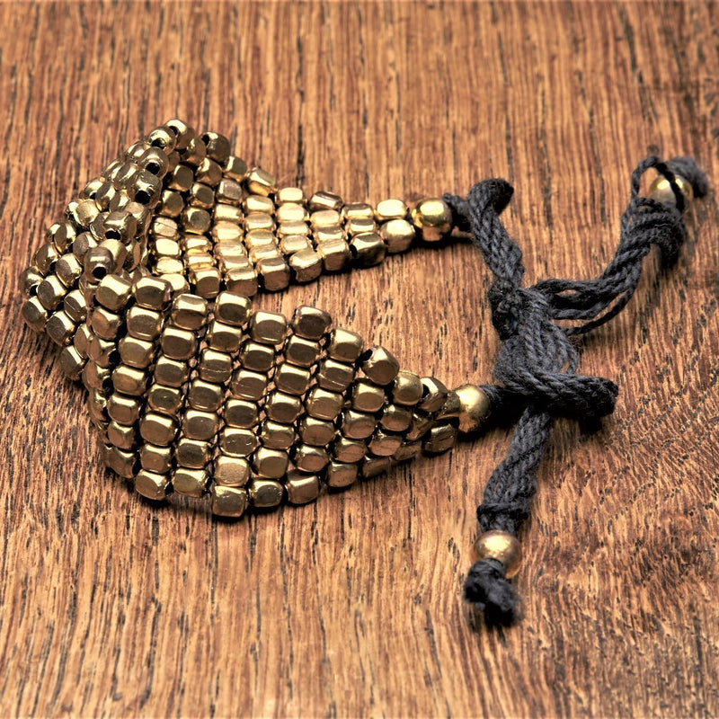 Artisan handmade pure brass, simple and adjustable, cube beaded Naga tribe bracelet designed by OMishka.