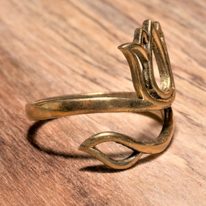 An adjustable, pure brass open lotus flower ring designed by OMishka.