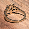 An adjustable, dainty, pure brass lotus flower ring designed by OMishka.