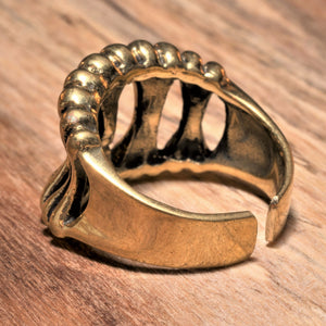 An adjustable, handmade pure brass band, skeletal bone shaped ring designed by OMishka.