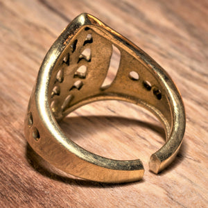 An adjustable, handmade pure brass, tribal shield ring designed by OMishka.