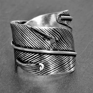 An adjustable, handmade solid silver, chunky wrap ring designed by OMishka.