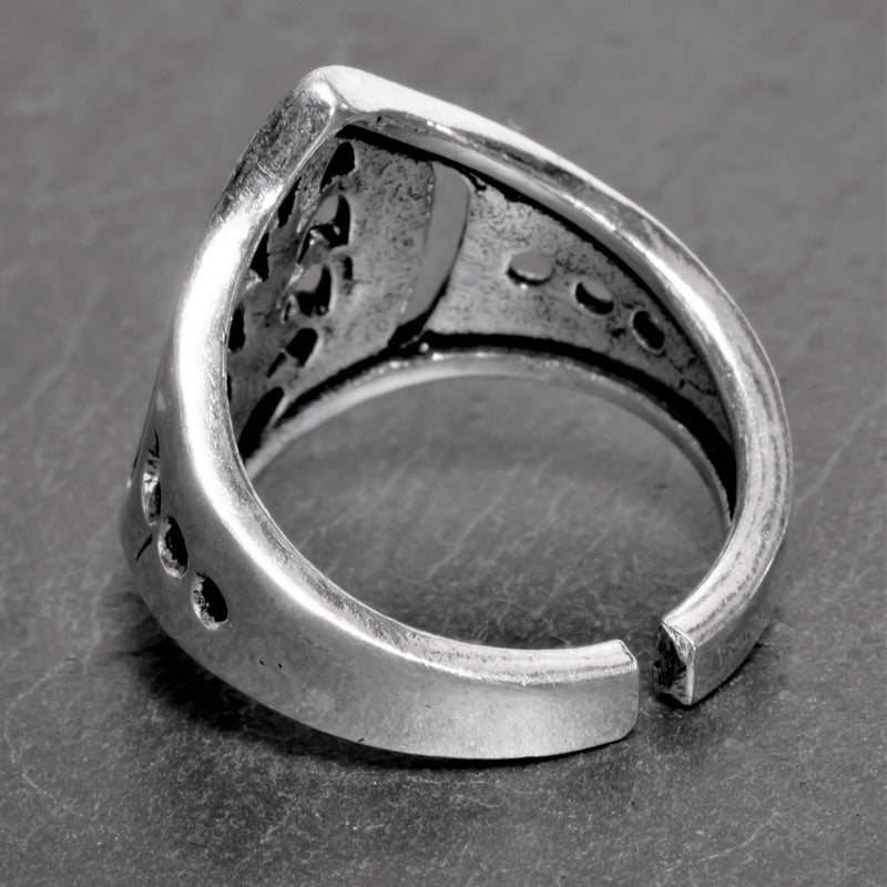 A handmade, adjustable, solid silver tribal shield ring designed by OMishka.