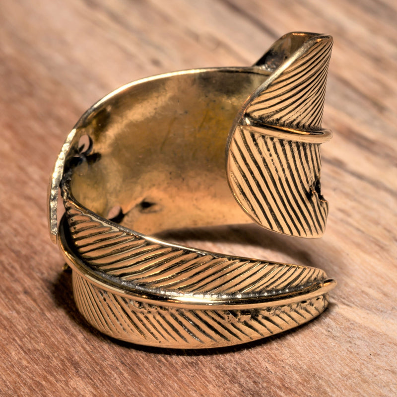 An adjustable, nickel free pure brass, chunky feather wrap ring designed by OMishka.