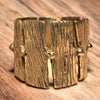An adjustable, chunky, nickel free pure brass, tree bark textured ring designed by OMishka.