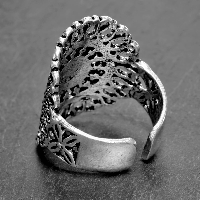 An adjustable, chunky, nickel free solid silver, filigree mandala ring designed by OMishka.