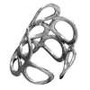 An adjustable, nickel free solid silver, long open circle wrap ring designed by OMishka.