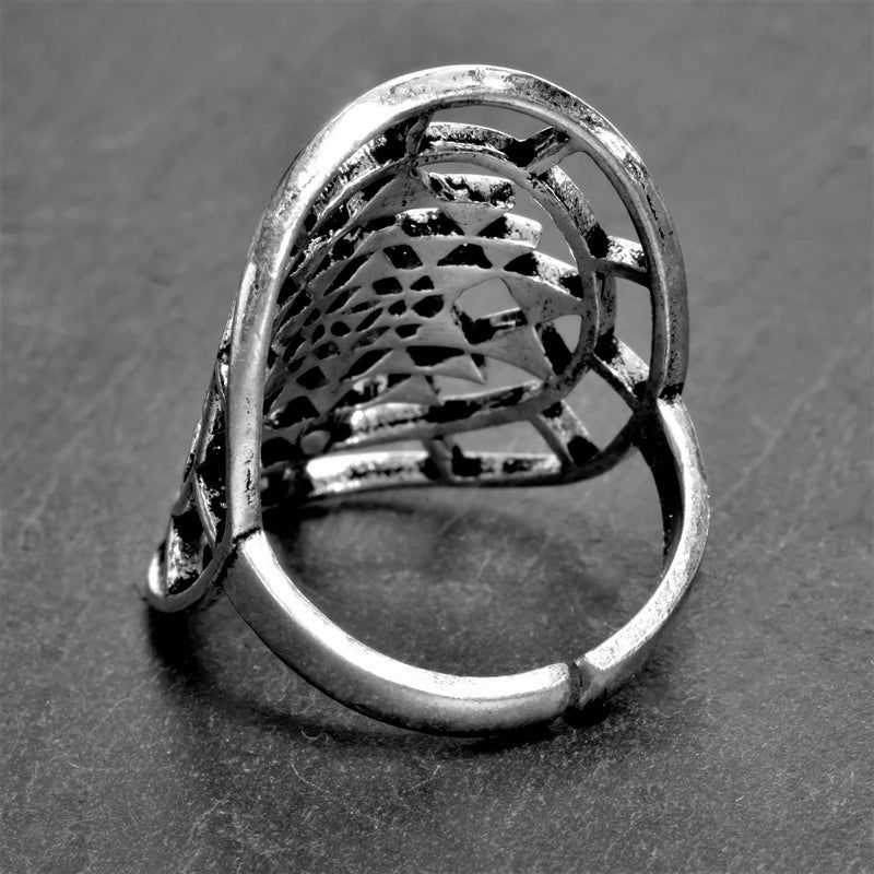 An adjustable, chunky, nickel free solid silver, Sri Yantra mandala ring designed by OMishka.