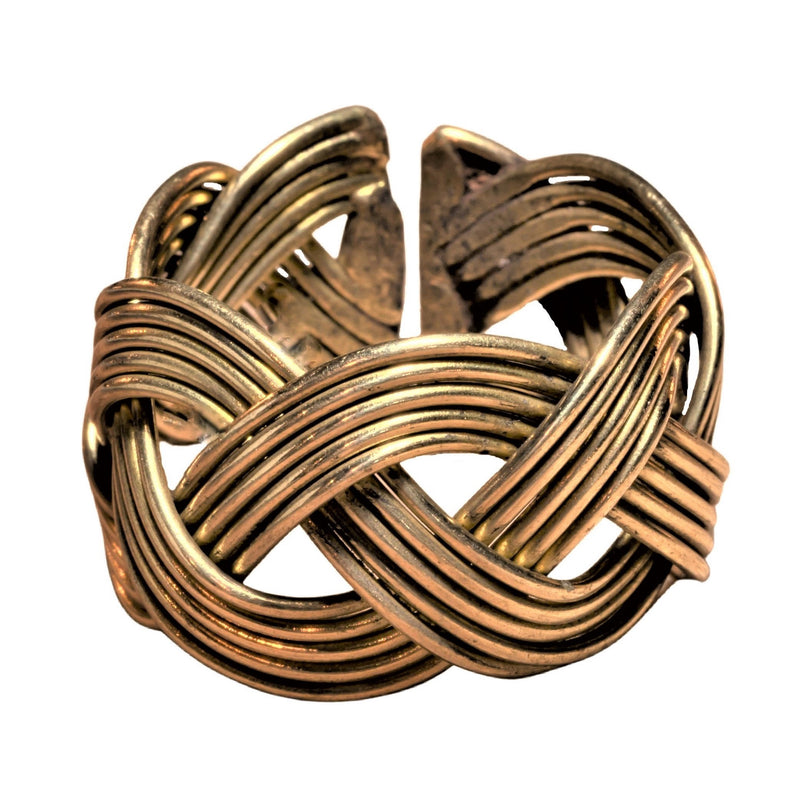 An adjustable, chunky, open weave pure brass ring designed by OMishka.