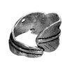 An adjustable, solid silver feather wrap ring designed by OMishka.