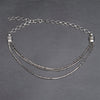 Handmade silver toned white metal, layered three strand, subtle beaded, adjustable snake chain necklace designed by OMishka.