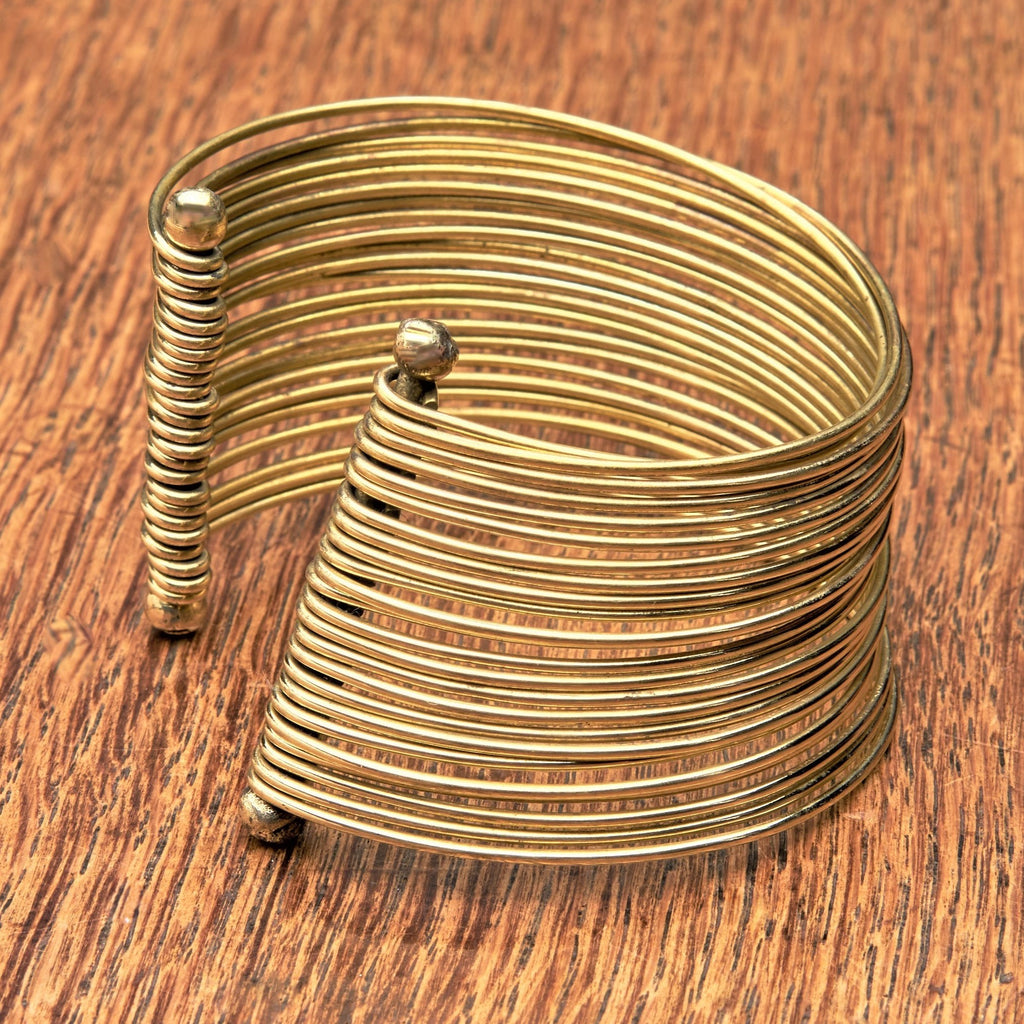 An adjustable, wide pure brass multi strand bracelet designed by OMishka.