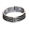 An artisan handmade, adjustable, solid silver etched tree bark patterned band toe ring designed by OMishka.