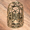 A chunky, artisan handmade, pure brass, decorative seed of life ring designed by OMishka.