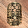 A large, adjustable, artisan handmade pure brass, flower of life ring designed by OMishka.