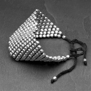 Artisan handmade silver cube beaded, Naga tribe woven adjustable black drawstring bracelet designed by OMishka.