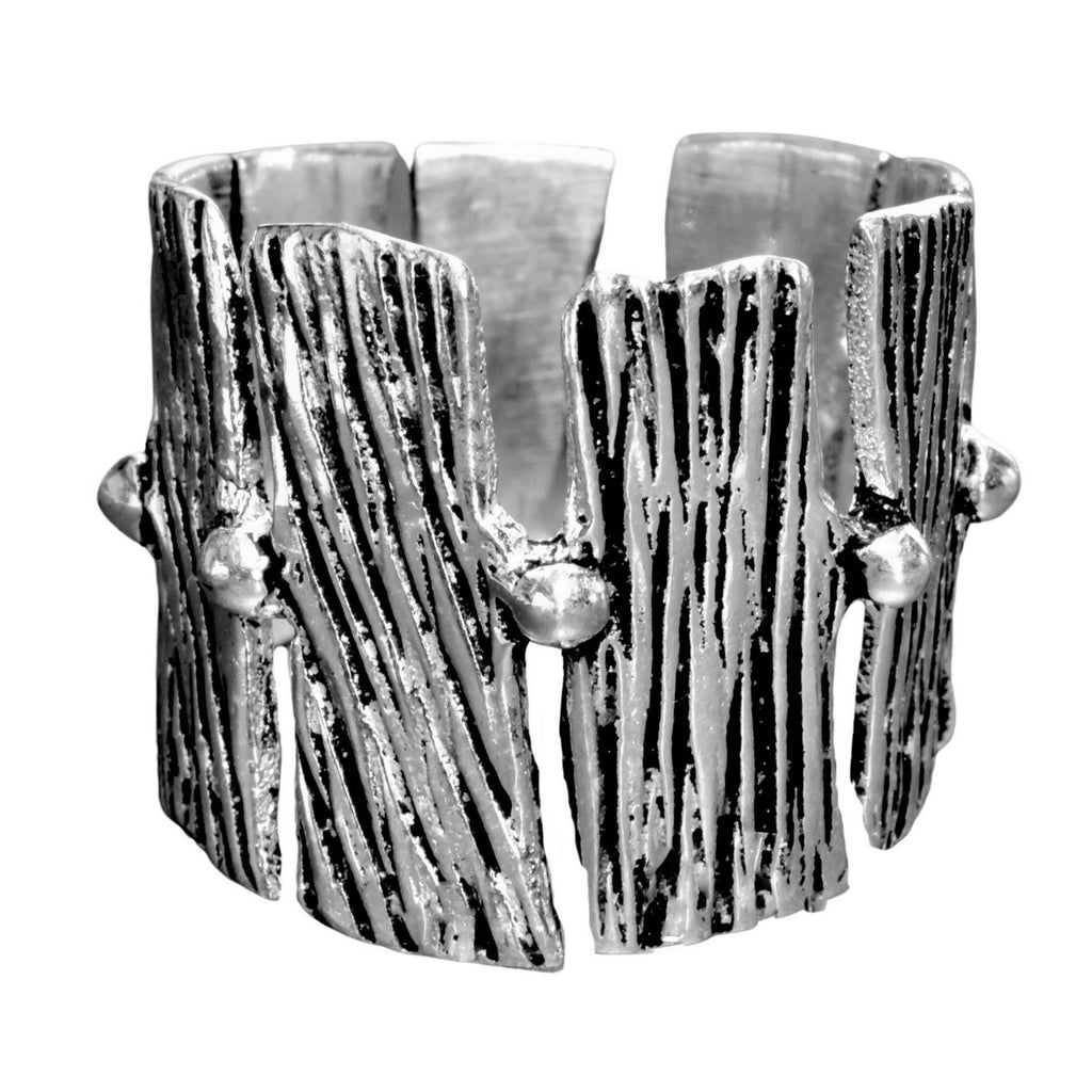 An adjustable, chunky, artisan handmade solid silver, tree bark textured ring designed by OMishka.