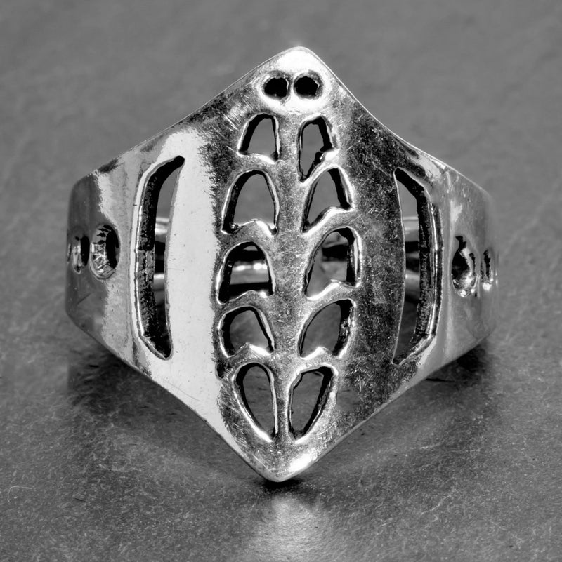 An artisan handmade, adjustable, solid silver tribal shield ring designed by OMishka.