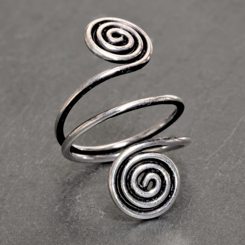An artisan handmade, adjustable double wrap, solid silver open spiral toe ring designed by OMishka.