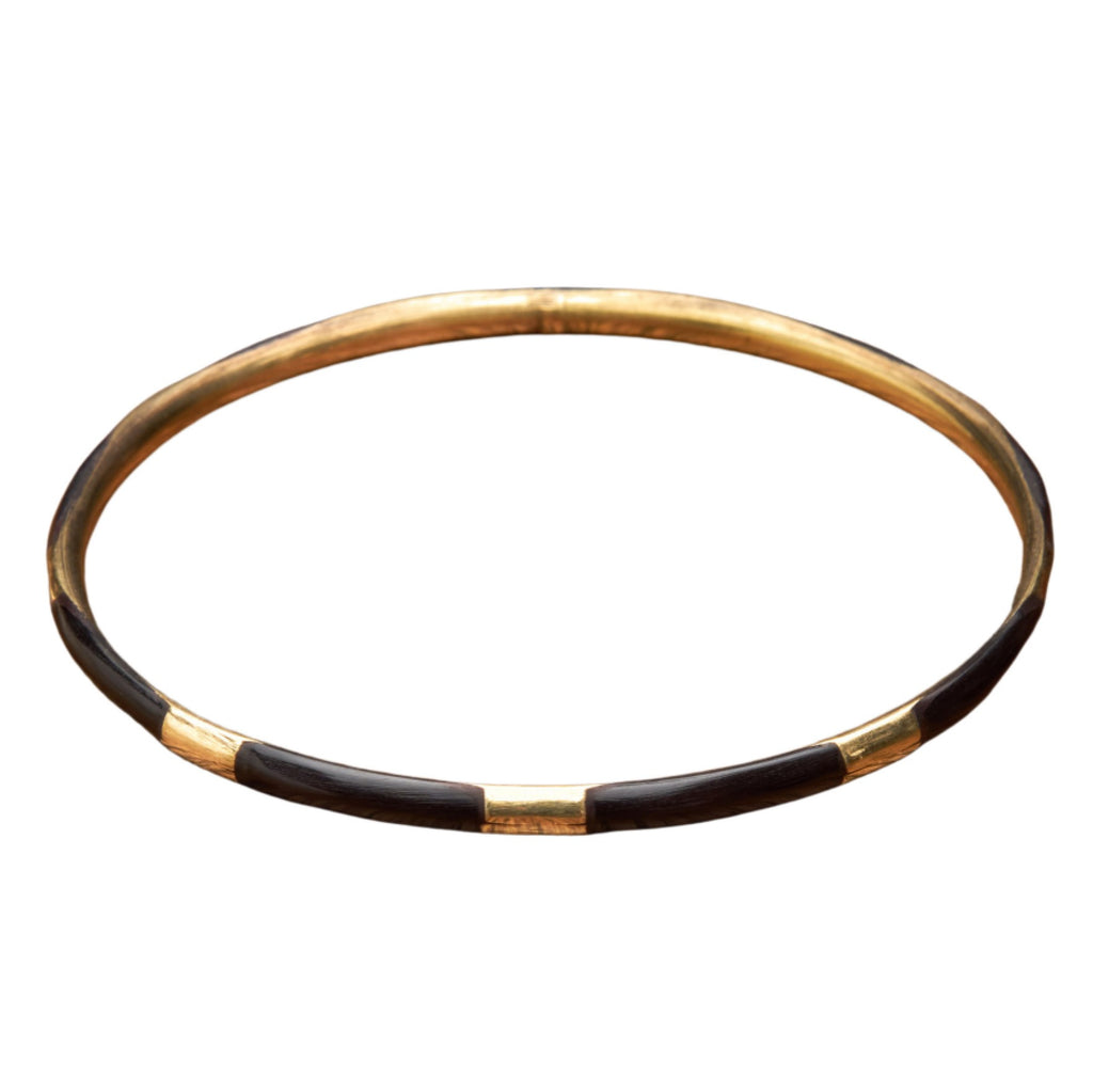 An artisan handmade, pure brass and black enamel striped thin bangle bracelet designed by OMishka.